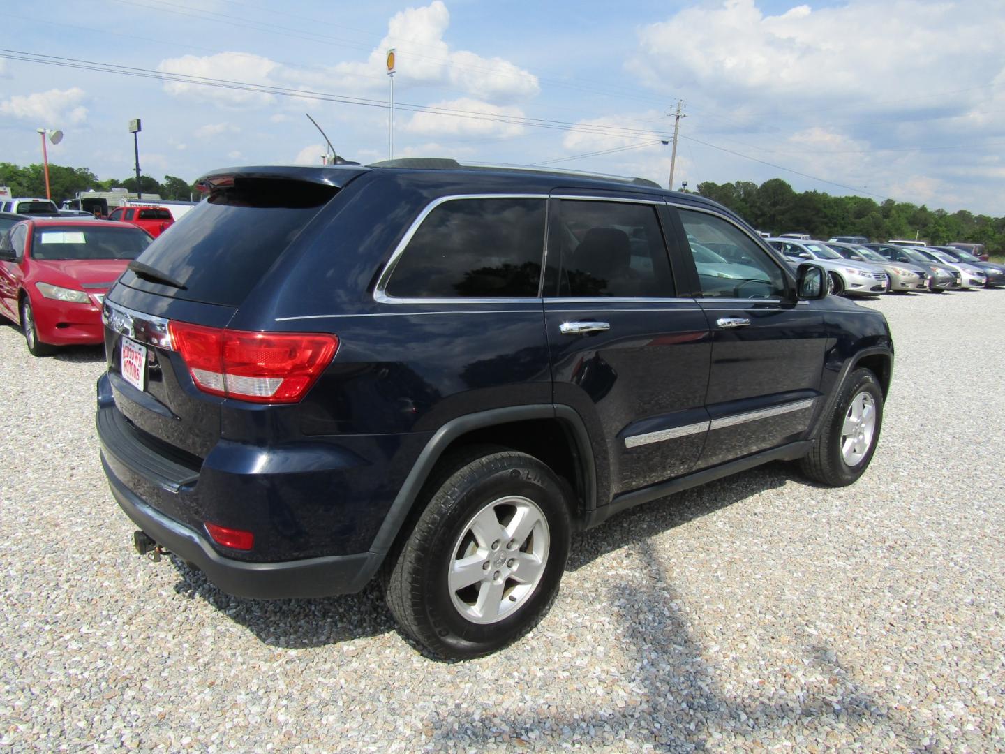 2013 Blue /Tan Jeep Grand Cherokee Laredo 2WD (1C4RJEAG1DC) with an 3.6L V6 DOHC 24V engine, Automatic transmission, located at 15016 S Hwy 231, Midland City, AL, 36350, (334) 983-3001, 31.306210, -85.495277 - Photo#7